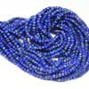 Natural Blue Lapis Lazuli Faceted Roundel Beads Strand Length 14 inches strand and Size 3mm approx.Royal Blue color beads. Lapis lazuli is a deep blue with a touch of purple and flecks of iron pyrite. Lapis consists of Lapis (blue, calcite (white streaks) and silver flakes of pyrite. Deep blue color gemstones are of best kind. 